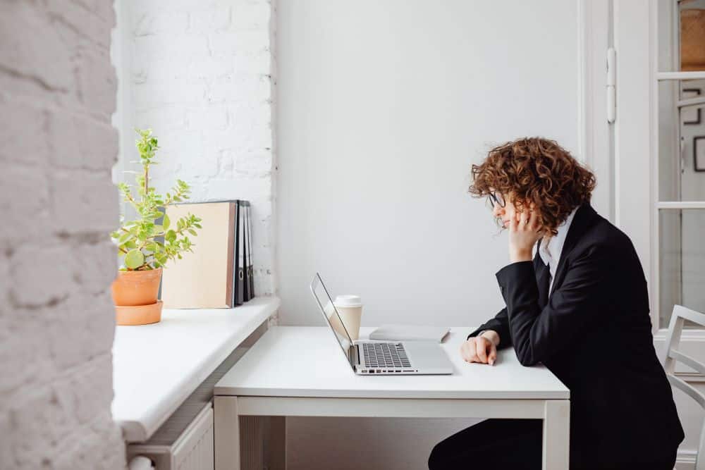Woman at a Desk on a Laptop