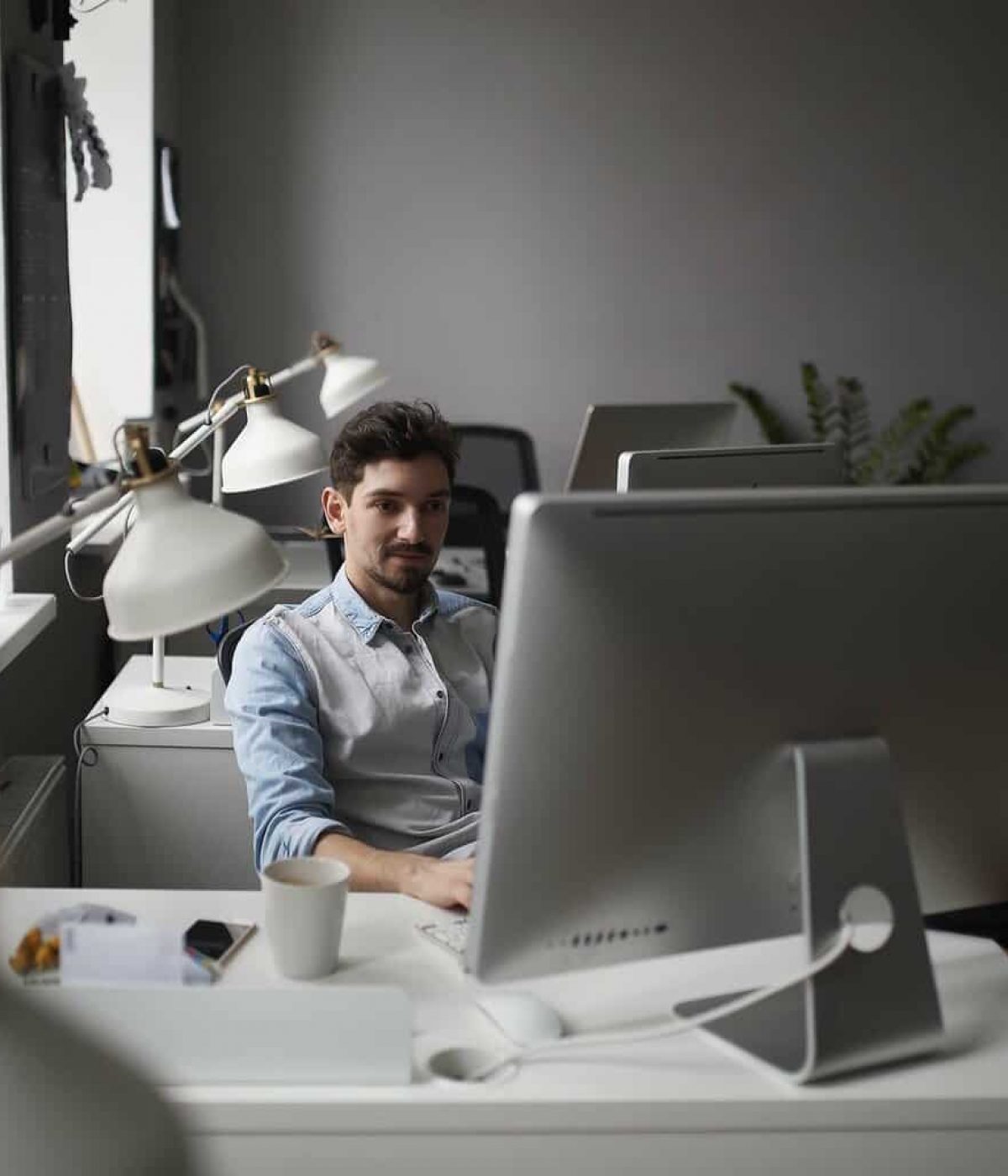 Cyber security engineer working at computer